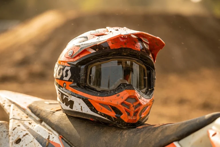Motocross helmet with goggles fitted on the eye port